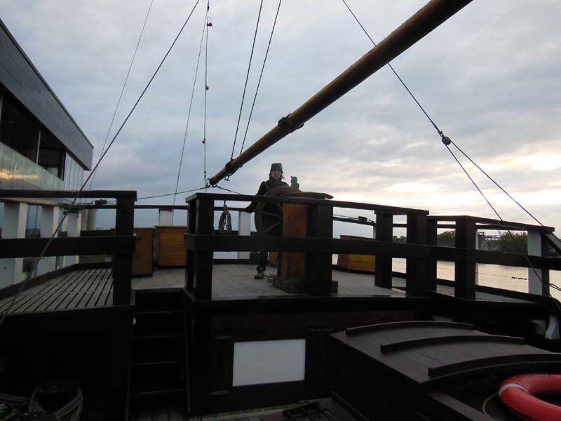 088Sue_at_the_helm_of_Dunbrody_ship_replica