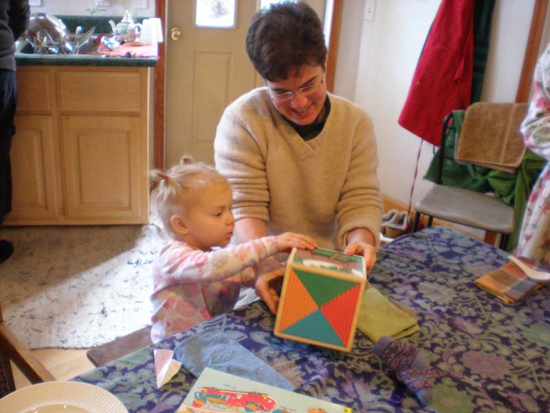 34Amy_Kayla_unwrap_present