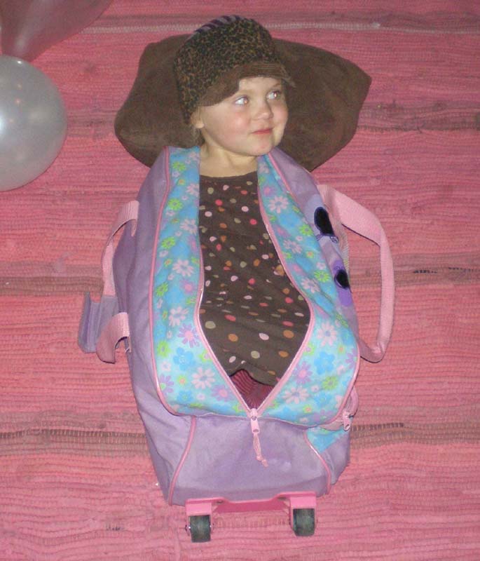 26Kayla_in_travel_bag